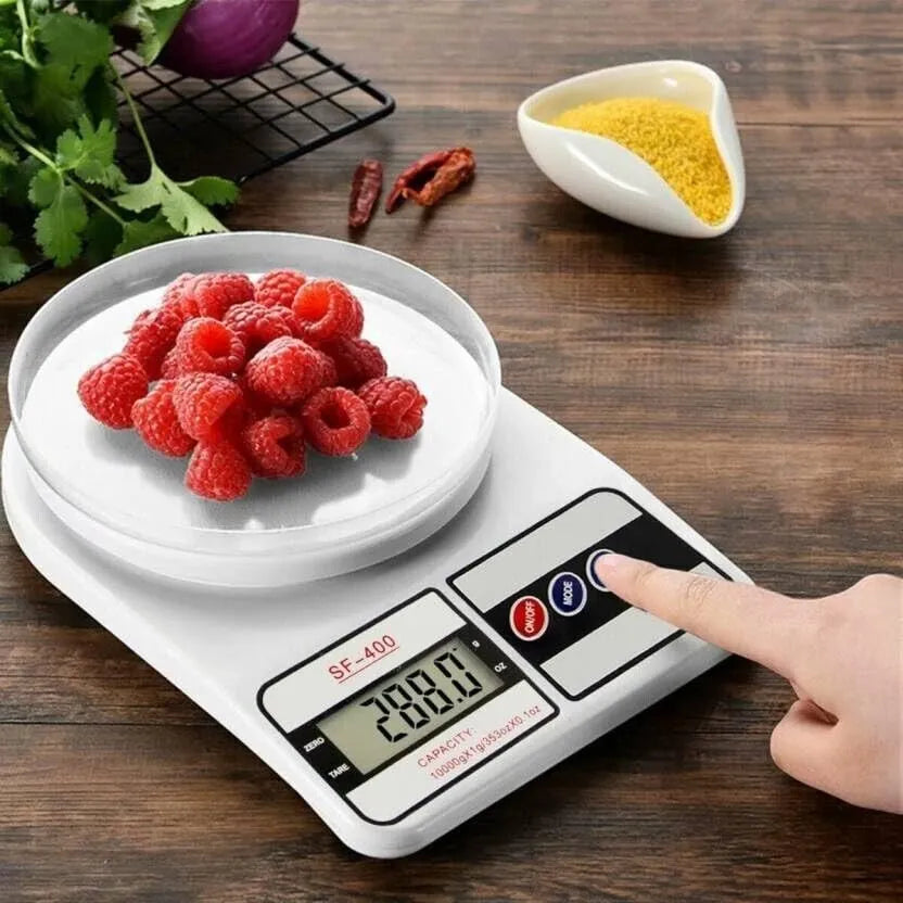 Weigh ingredients precisely with the SF-400 electronic kitchen scale. LCD display, tare function, compact design—perfect for baking & cooking.