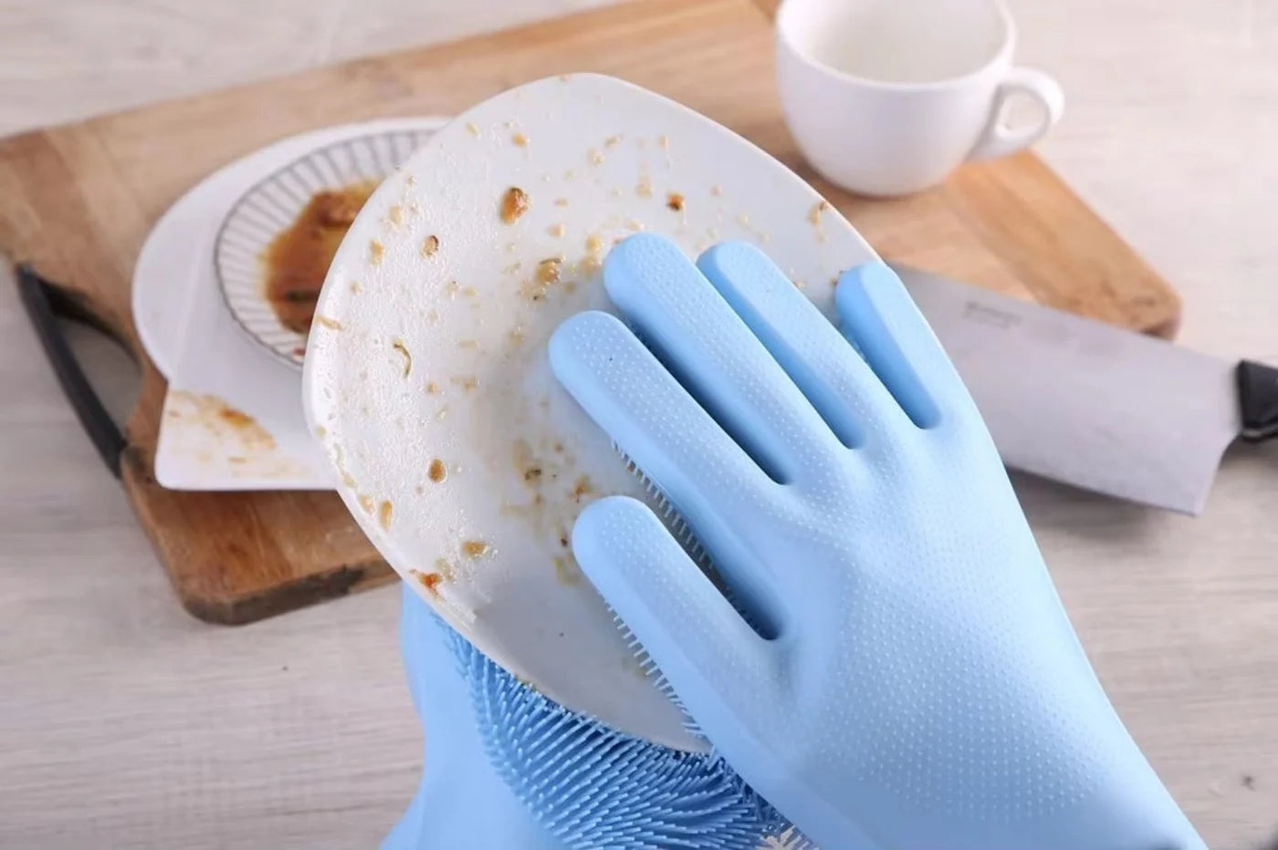 Wash dishes faster with these silicone scrubber gloves. Built-in bristles, waterproof & heat resistant—great for kitchen, bathroom & pet grooming.